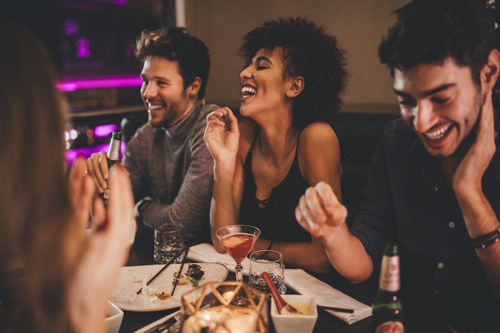 people enjoying a happy hour meal